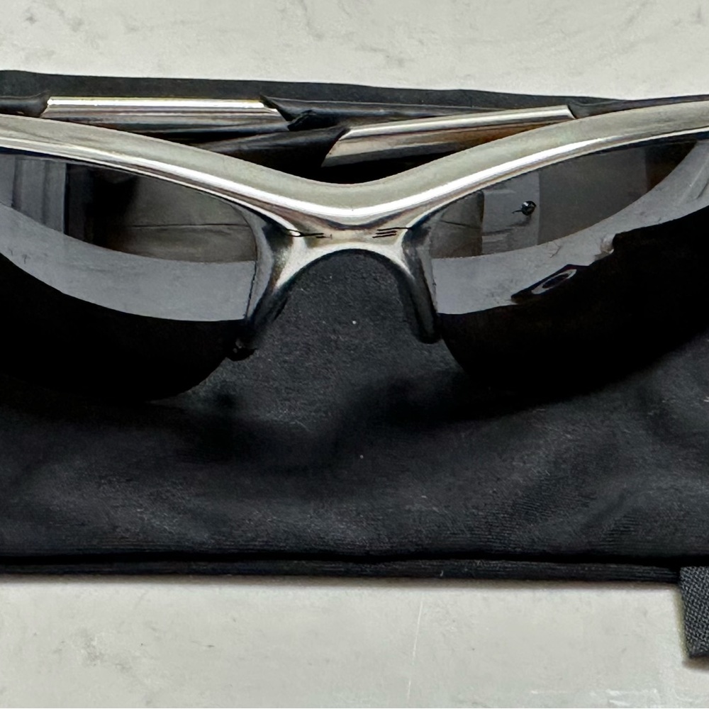 Oakley Titanium half jacket sunglasses. Need mint condition.